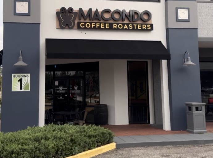 Exterior storefront and entrance of Macondo Coffee Roasters in Wesley Chapel, Florida